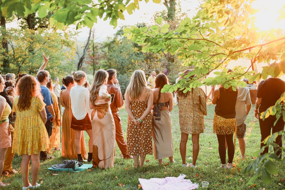 Community gathering at golden hour