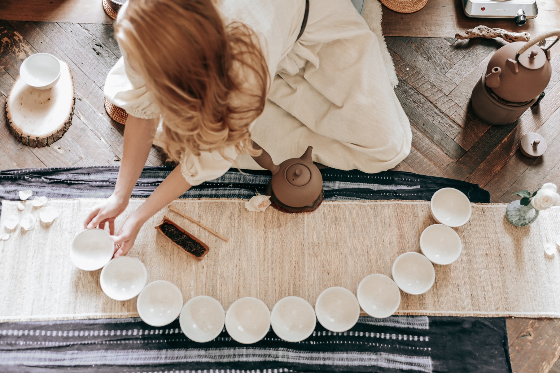 Overhead view of tea bowls arranged for ceremony